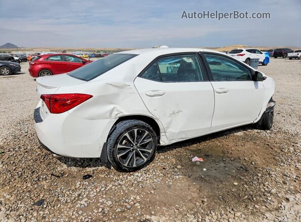 5YFBURHE5KP883541 2019 TOYOTA COROLLA White Trasero derecho