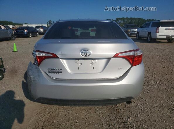 5YFBURHE6GP399997 2016 TOYOTA COROLLA Silver Vista trasera