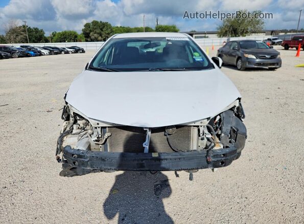 5YFBURHE6GP460877 2016 TOYOTA COROLLA Белый Вид спереди