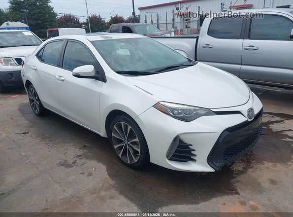 5YFBURHE6HP725055 2017 TOYOTA COROLLA Белый Вид задней части салона