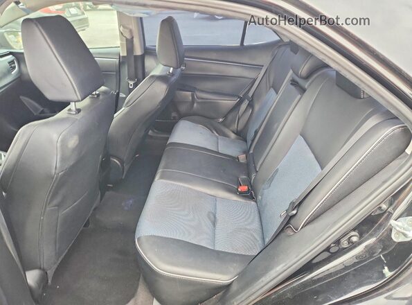 5YFBURHE8GP420669 2016 TOYOTA COROLLA Black Vista de los asientos traseros