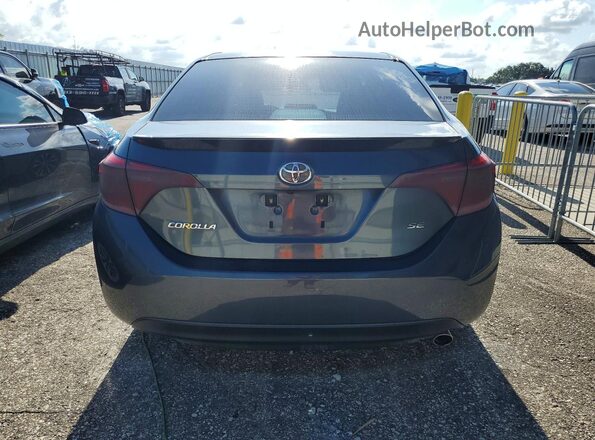 5YFBURHE8HP648480 2017 TOYOTA COROLLA Gray უკანა ხედი