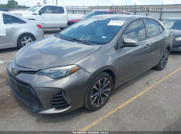5YFBURHE8HP732833 2017 TOYOTA COROLLA Gray Front left