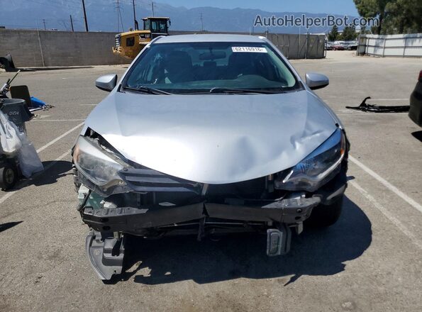 5YFBURHE9GP472537 2016 TOYOTA COROLLA Серебряный Вид спереди