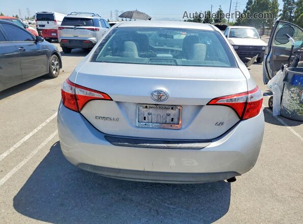 5YFBURHE9GP472537 2016 TOYOTA COROLLA Серебряный Вид сзади
