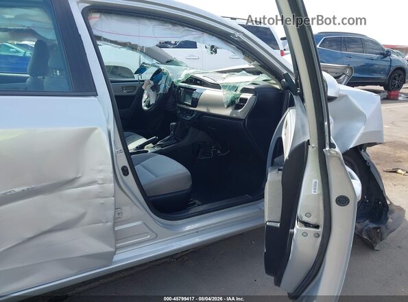 5YFBURHE9GP527620 2016 TOYOTA COROLLA Серый Вид салона спереди