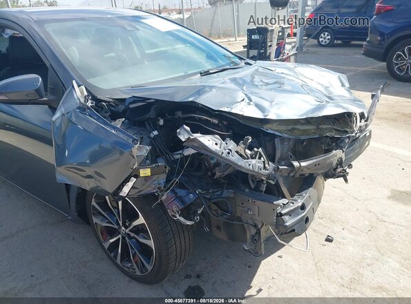 5YFBURHE9JP769931 2018 TOYOTA COROLLA Серый Вид спереди