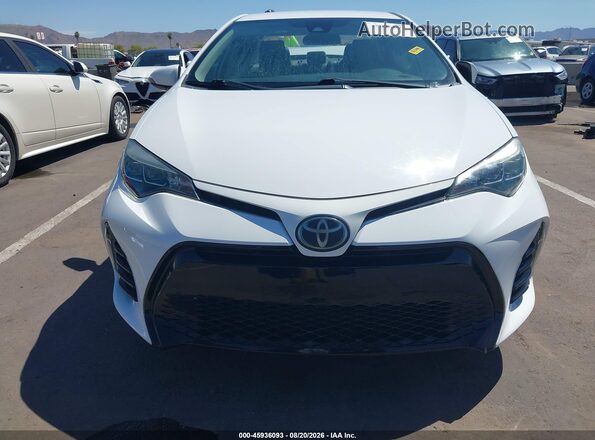5YFBURHE9KP858030 2019 TOYOTA COROLLA Белый Вид задней части салона