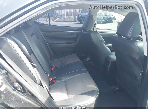 5YFBURHEXGP385424 2016 TOYOTA COROLLA Black VIN კოდის სტიკერის ხედი