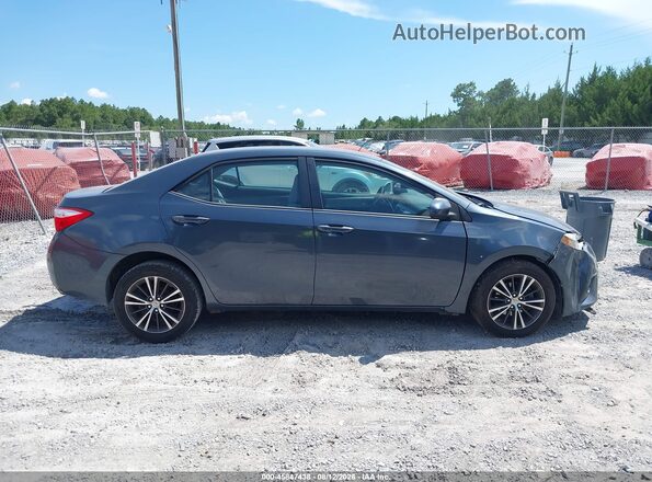5YFBURHEXGP394673 2016 TOYOTA COROLLA Blue Вид задньої частини салону