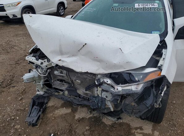 5YFBURHEXGP521938 2016 TOYOTA COROLLA White Սալոնի հետևի տեսք