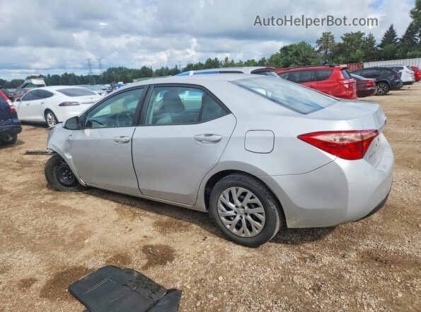 5YFBURHEXHP690990 2017 TOYOTA COROLLA Серебряный Задняя левая четверть