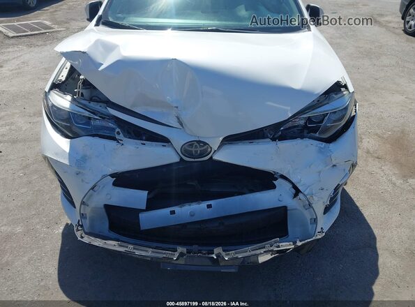 5YFBURHEXJP788780 2018 TOYOTA COROLLA White Vista frontal