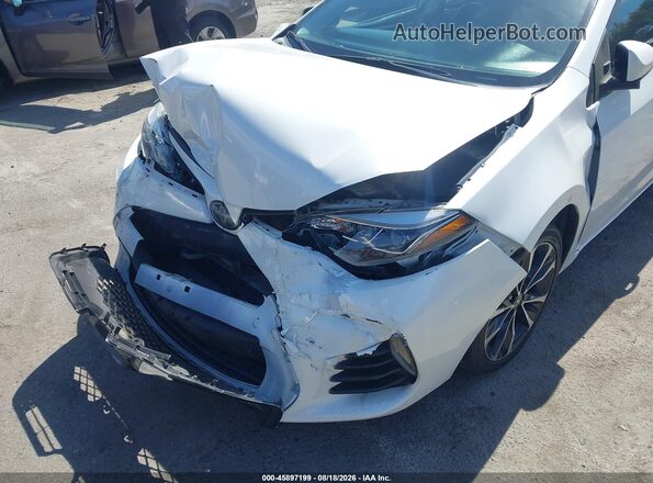 5YFBURHEXJP788780 2018 TOYOTA COROLLA White 