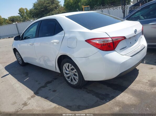 5YFBURHEXKP875032 2019 TOYOTA COROLLA White Trasero izquierdo
