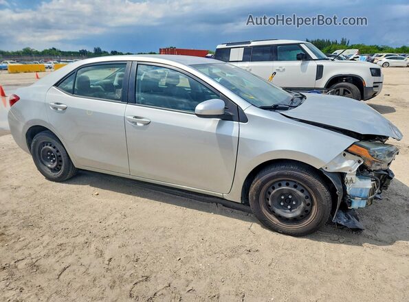 5YFBURHEXKP934175 2019 TOYOTA COROLLA Silver წინა მარჯვენა