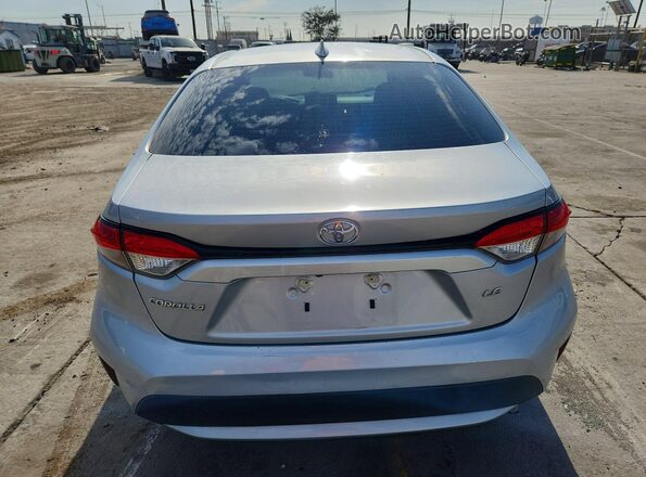 5YFEPMAE2NP325460 2022 TOYOTA COROLLA Silver Вид ззаду