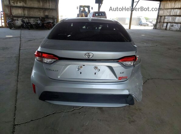 5YFEPMAE4NP273586 2022 TOYOTA COROLLA Silver Rear view