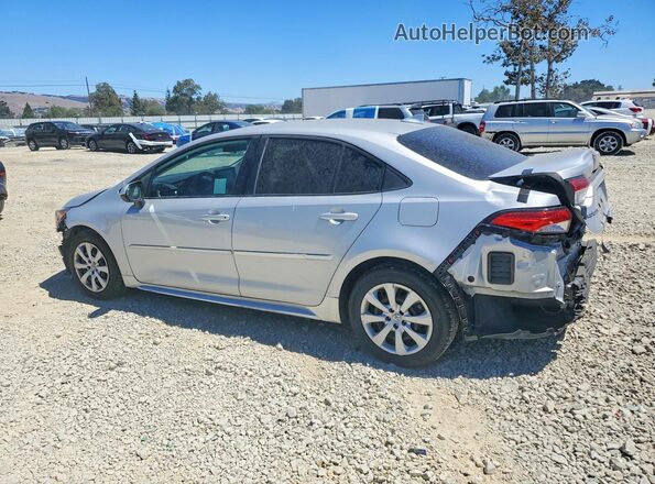 5YFEPMAE6MP193253 2021 TOYOTA COROLLA Silver Trasero izquierdo