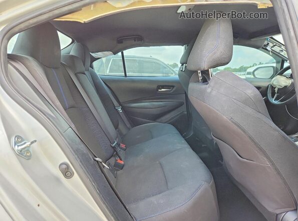 5YFS4MCE0MP089107 2021 TOYOTA COROLLA Silver Rear seats view