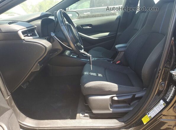 5YFS4MCE1NP099758 2022 TOYOTA COROLLA Black Front interior view