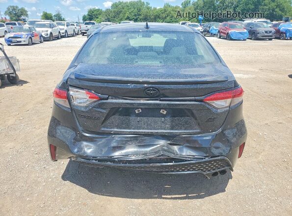 5YFS4MCE1NP099758 2022 TOYOTA COROLLA Black Rear view