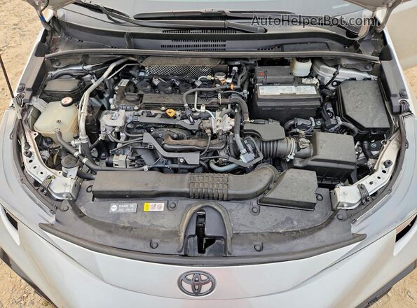 5YFS4MCE2NP127857 2022 TOYOTA COROLLA Silver Вид задньої частини салону