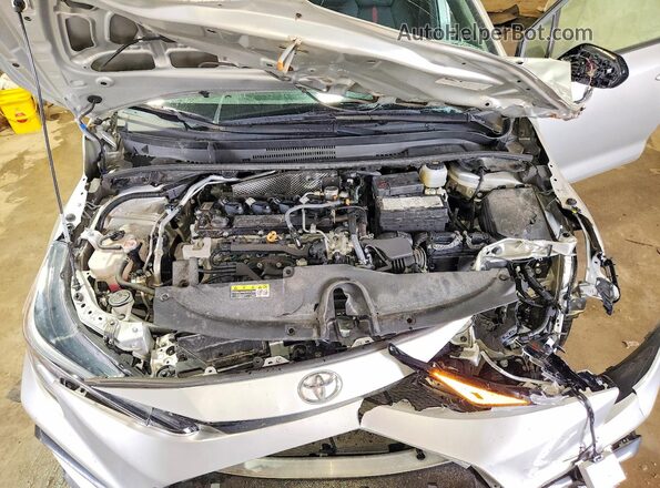 5YFS4MCE2RP209058 2024 TOYOTA COROLLA Silver Rear interior view