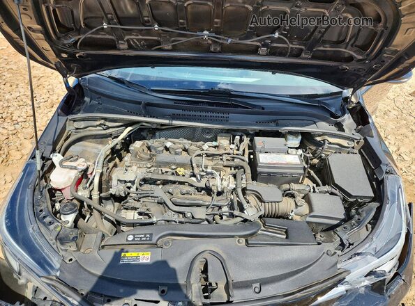 5YFS4MCE3RP171064 2024 TOYOTA COROLLA Black Rear interior view