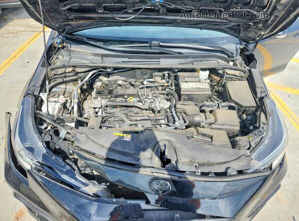 5YFS4MCE4RP180582 2024 TOYOTA COROLLA Black Rear interior view
