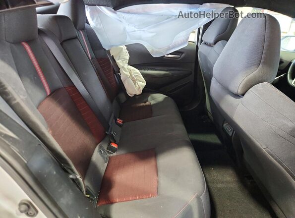 5YFS4MCE8SP227313 2025 TOYOTA COROLLA Silver Rear seats view