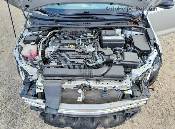 5YFS4MCE9NP122171 2022 TOYOTA COROLLA Silver Vista interior trasera