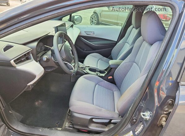 5YFS4MCE9PP159952 2023 TOYOTA COROLLA Серый Вид салона спереди
