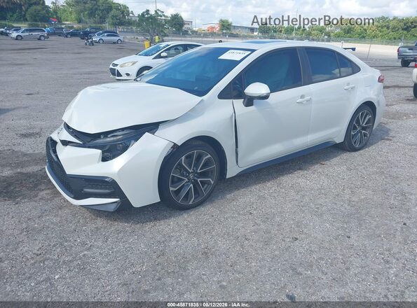 5YFT4MCE1MP060932 2021 TOYOTA COROLLA White Vista tres cuartos delantera izquierda