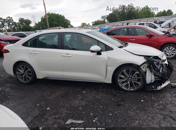 5YFT4MCE1MP077178 2021 TOYOTA COROLLA White Rear interior view
