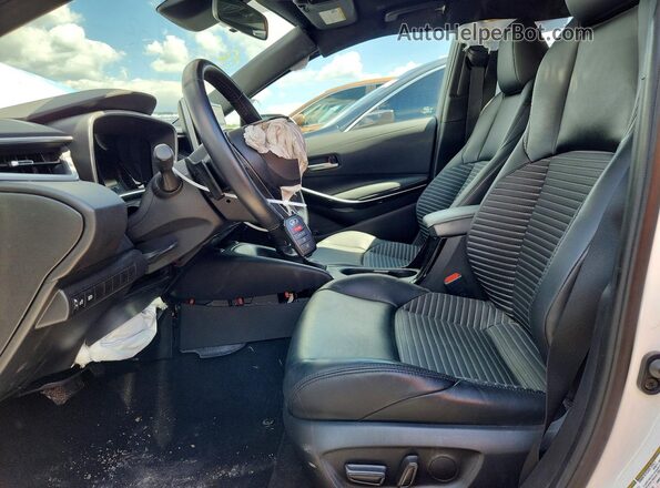 5YFT4MCE7PP157783 2023 TOYOTA COROLLA White Front interior view