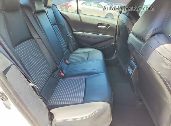 5YFT4MCE7PP157783 2023 TOYOTA COROLLA White Rear seats view