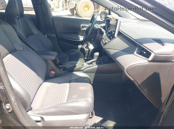 5YFT4MCE8MP061902 2021 TOYOTA COROLLA Black Front interior view