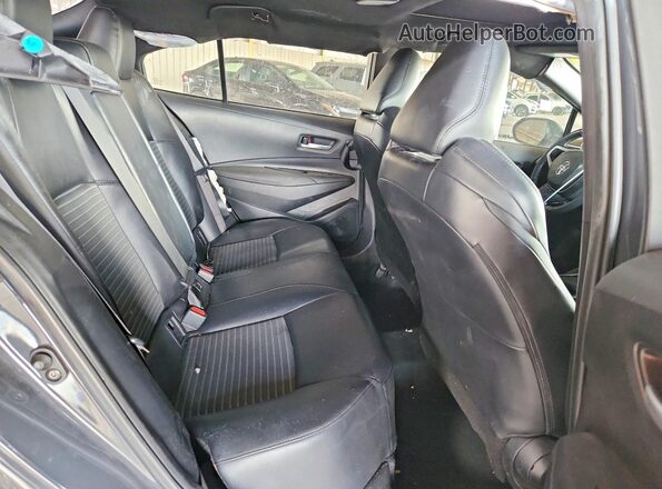 5YFT4MCE8PP164368 2023 TOYOTA COROLLA Gray Rear seats view