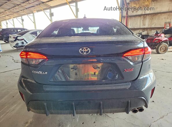 5YFT4MCE8PP164368 2023 TOYOTA COROLLA Gray Rear view