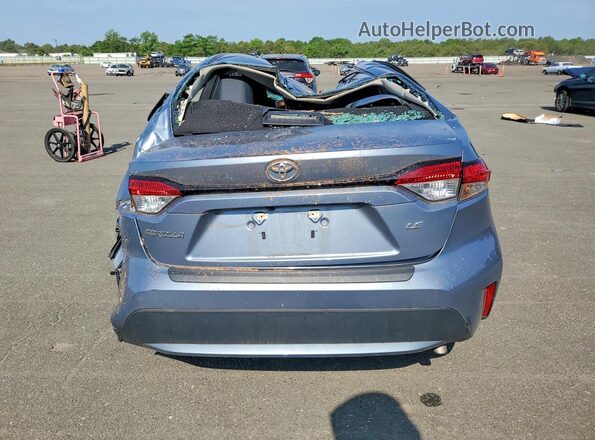 5YFVPMAE8NP284283 2022 TOYOTA COROLLA Blue Rear view