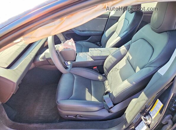 5YJ3E1EA2RF725569 2024 TESLA MODEL Charcoal Front interior view