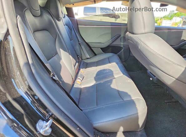5YJ3E1EA2SF041515 2025 TESLA MODEL Black Հետևի նստատեղերի տեսք