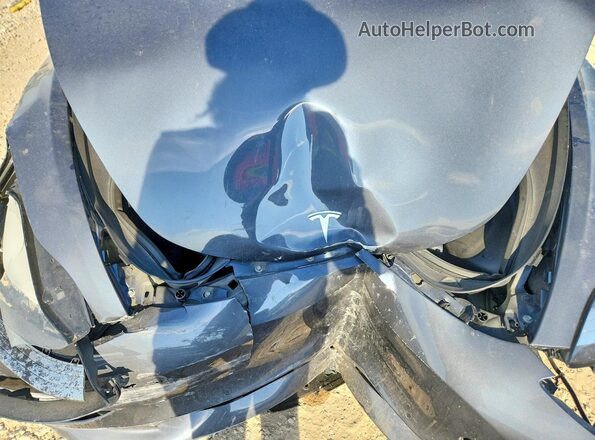 5YJ3E1EA4JF022012 2018 TESLA MODEL Gray Vista interior trasera