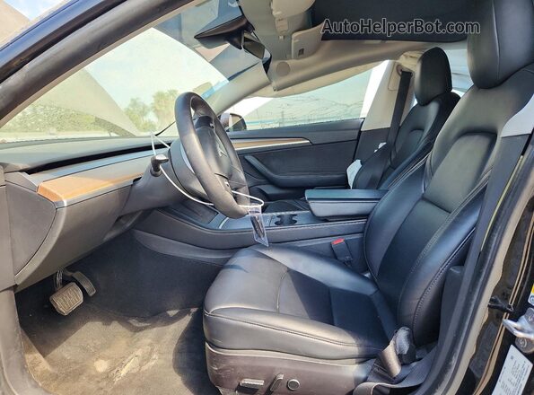5YJ3E1EA4MF023035 2021 TESLA MODEL Black Front interior view