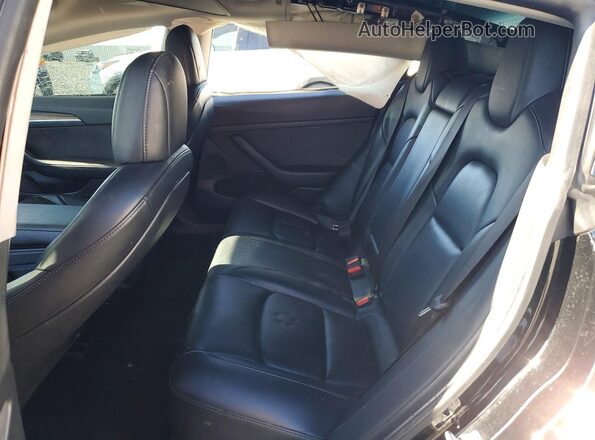 5YJ3E1EA4MF023035 2021 TESLA MODEL Black Rear seats view