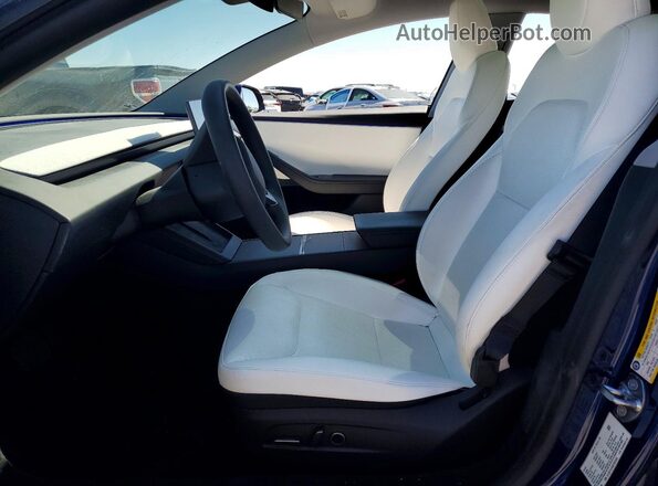 5YJ3E1EA5SF003504 2025 TESLA MODEL Blue Widok wnętrza z przodu