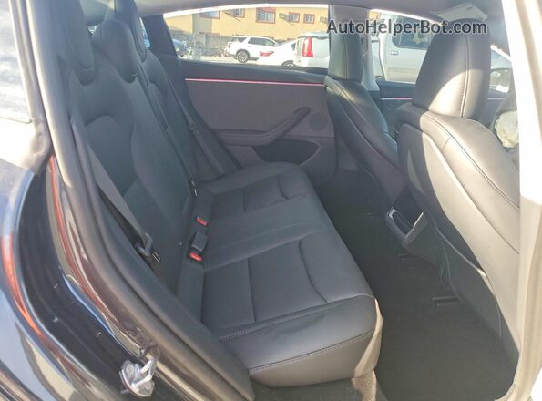 5YJ3E1EA6SF953497 2025 TESLA MODEL Black უკანა სავარძლების ხედი