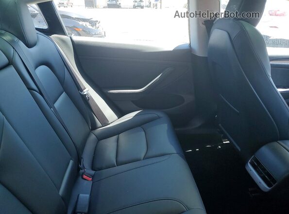 5YJ3E1EA7MF074710 2021 TESLA MODEL Black Vista de los asientos traseros