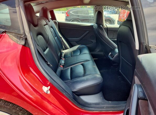 5YJ3E1EA9NF286512 2022 TESLA MODEL Red Vista de los asientos traseros